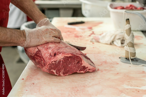 Butcher Carving Meat