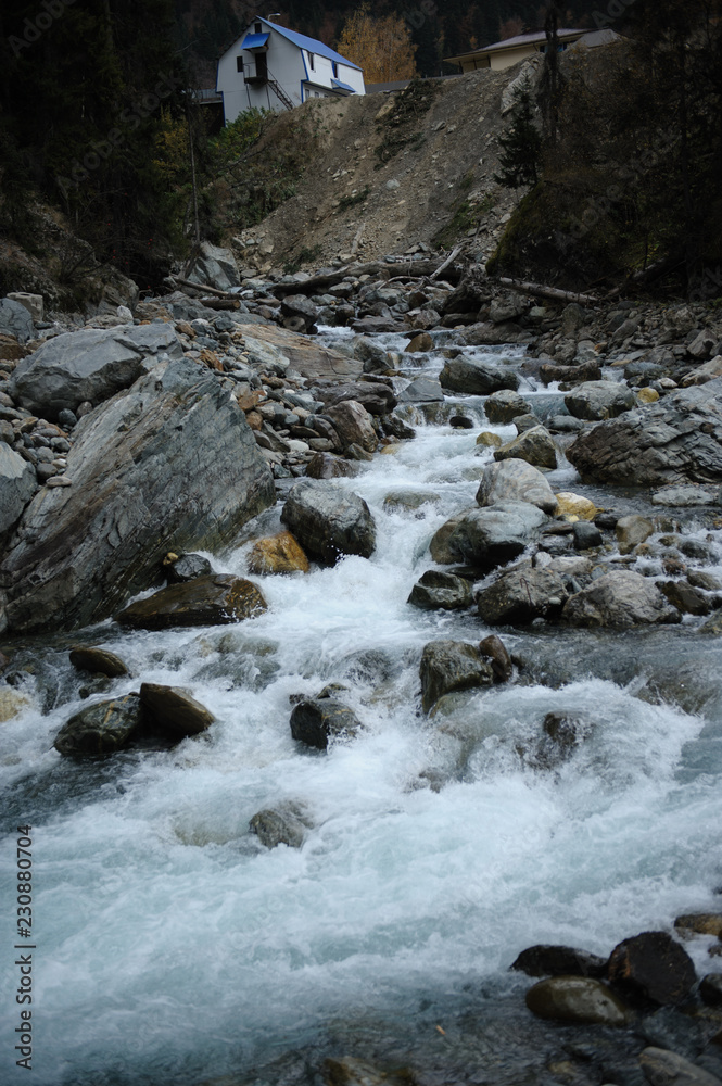 water flowing over rocks water flowing over rocks