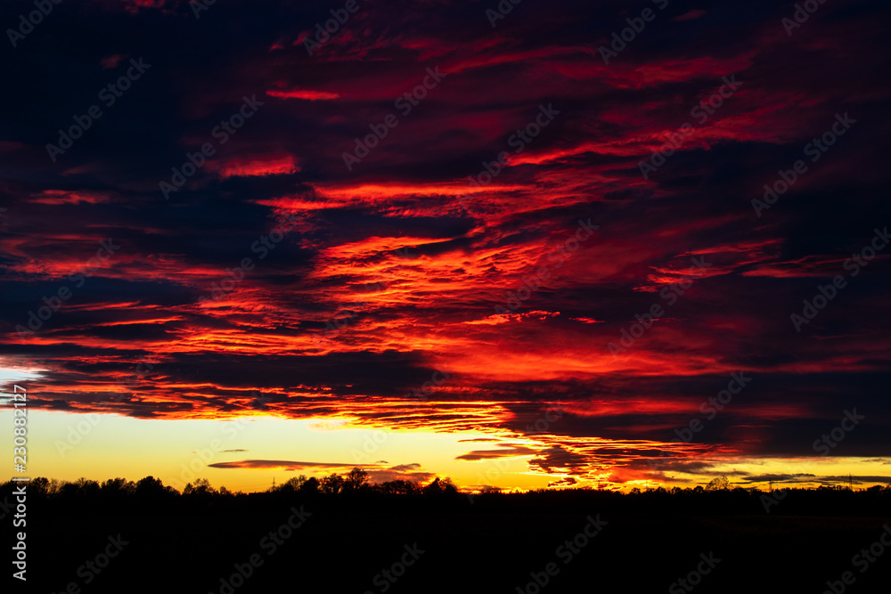 A beautiful orange and red sunset with colorful clouds