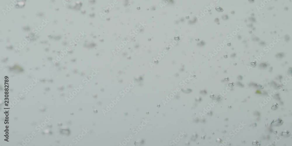 Lemon falling in water