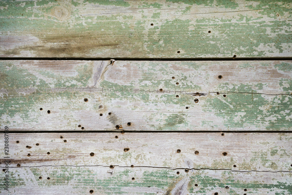 textured background of old wooden barn boards of different colors. square photo with copy space for text