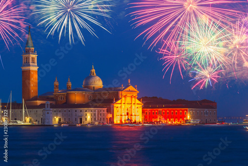 view of San Giorgio island at night with fireworks  Venice  Italy