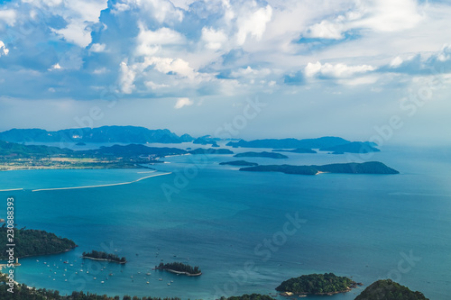 View of blue sky, sea and mountain seen from Cable Car viewpoint, Langkawi, Malaysia. Picturesque landscape with tropical forest, beaches, small Islands in waters of Strait of Malacca