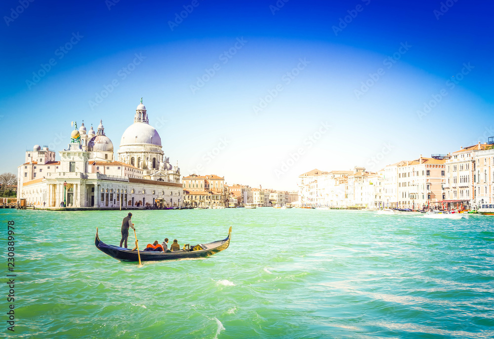 Fototapeta premium Basilica Santa Maria della Salute and Grand canal with gondola boat, Venice, Italy