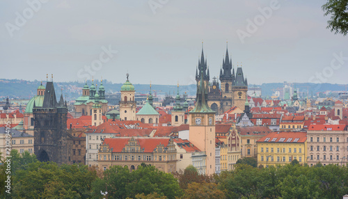 Old town of Prague. Czech Republic over river Vltava with cathedral and Charles bridge on skyline. Bright sunny day blue sky. Praha panorama landscape view
