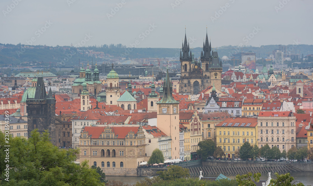 Obraz premium Scenic summer aerial view of the Old Town architecture and Charles Bridge over Vltava river in Prague, Czech Republic