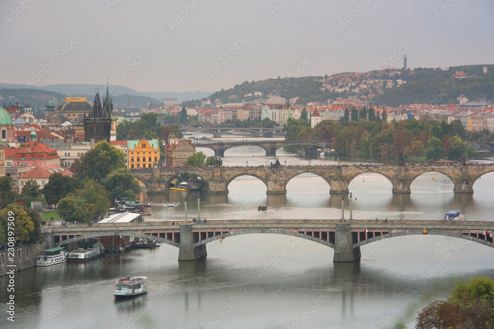 Obraz premium Scenic spring sunset aerial view of the Old Town pier architecture and Charles Bridge over Vltava river in Prague, Czech Republic