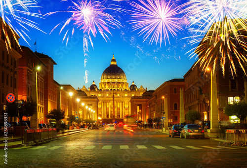 road to St. Peter's cathedral in Rome at night with fireworks, Italy