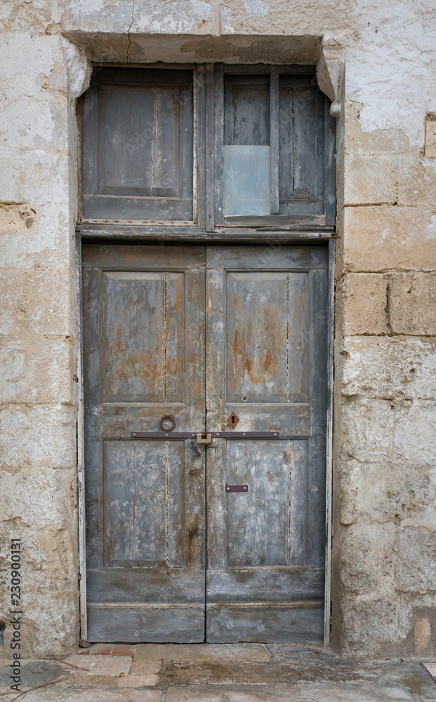 Ancient door in an old house, Matera. Italy