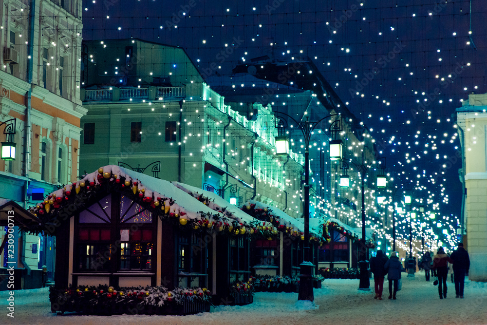 Night winter Moscow in the snow. Street decorated for the New year.