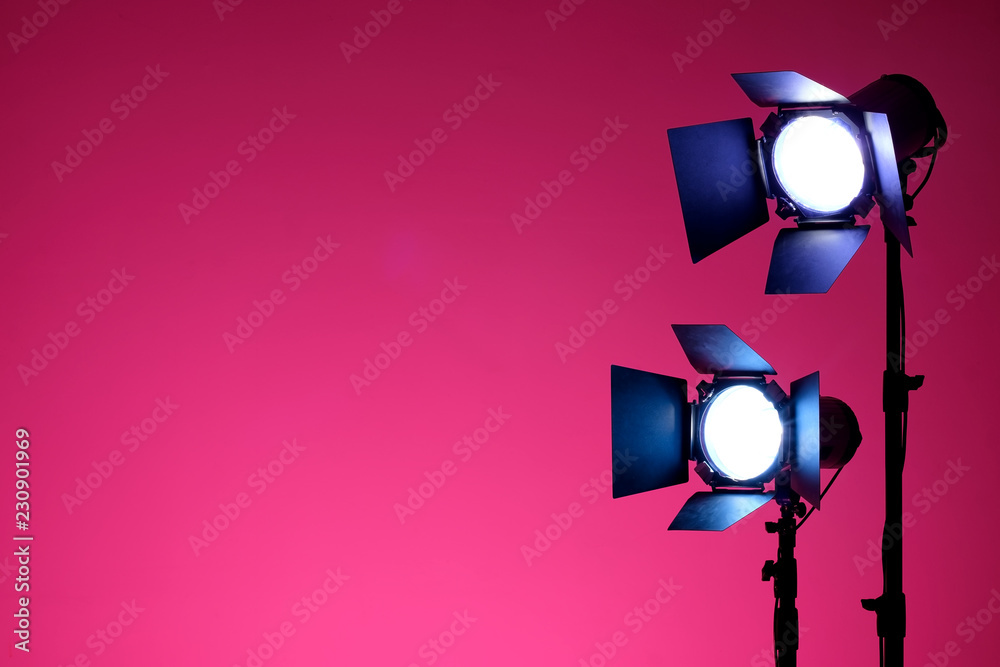 Equipment for photo studios and fashion photography. Pink background and reflector. Ready to shoot photo scheme concept. - obrazy, fototapety, plakaty 