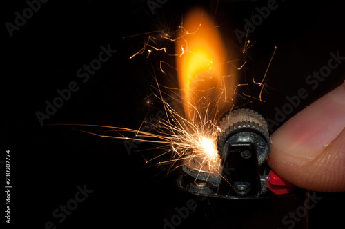 Photography The moment of ignition and spark of an old lighter