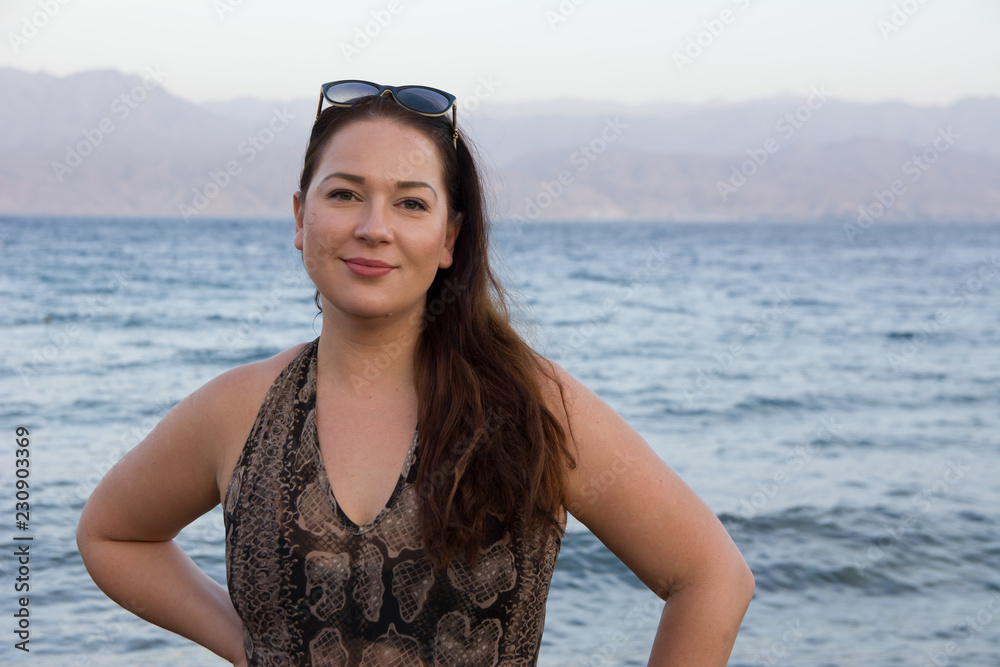 close up portrait young beautiful woman at sea . close up close up portrait young beautiful woman at sea . close up
