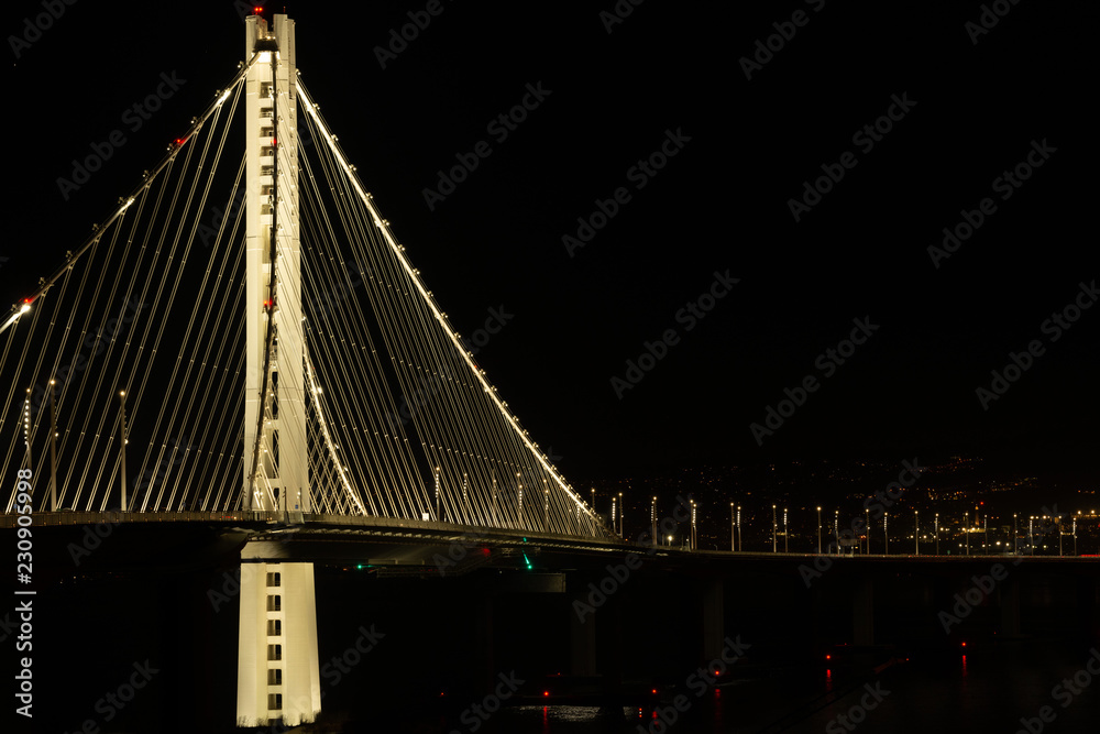 Fototapeta premium Eastside tower of the Bay Bridge at night under the lights