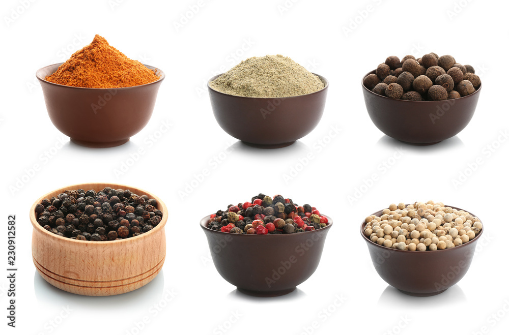 Set with powders and pepper corns on white background Set with powders and pepper corns on white background