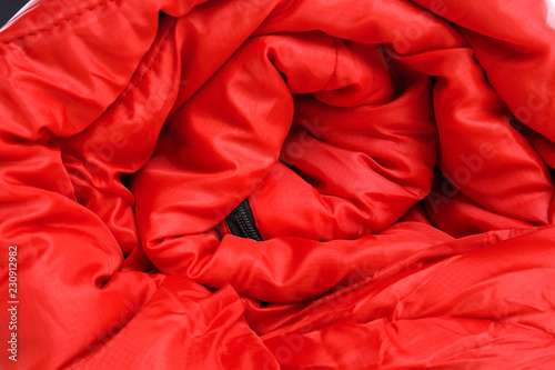 Rolled sleeping bag, closeup view. Camping equipment