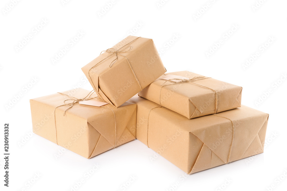 Parcels wrapped in kraft paper on white background Parcels wrapped in kraft paper on white background