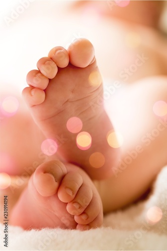 Baby human foot newborn close to moving