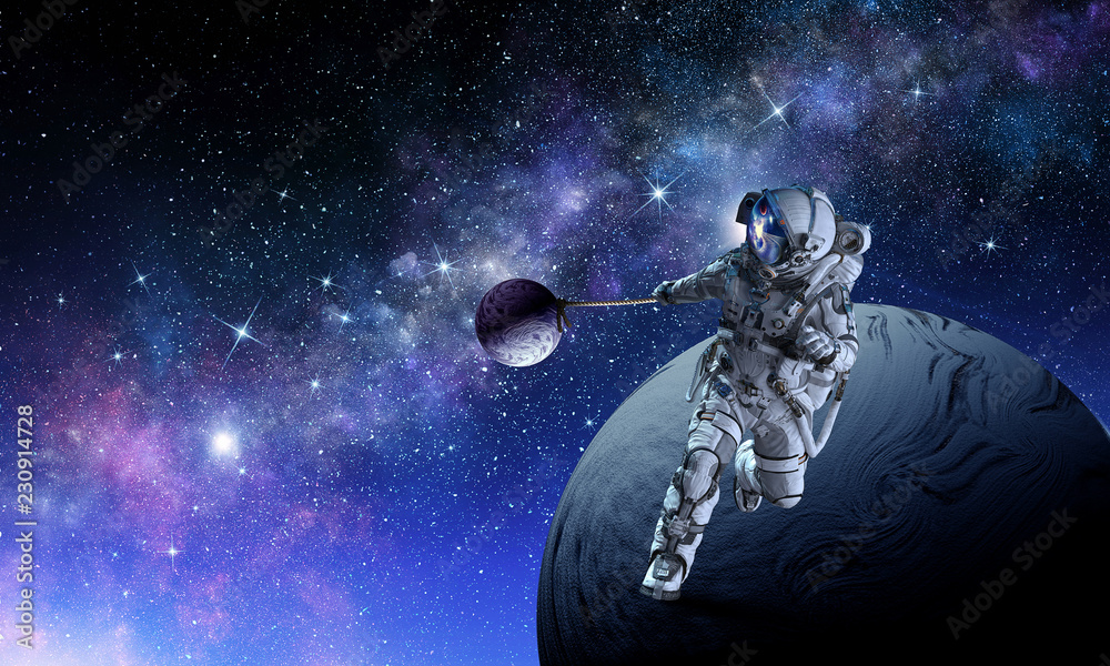 Fototapeta premium Spaceman steal planet. Mixed media