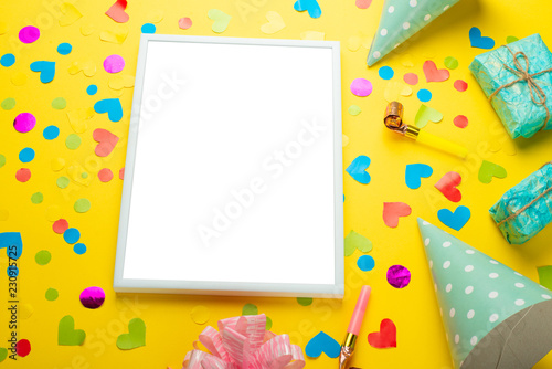 Birthday party background with party hats and streamers