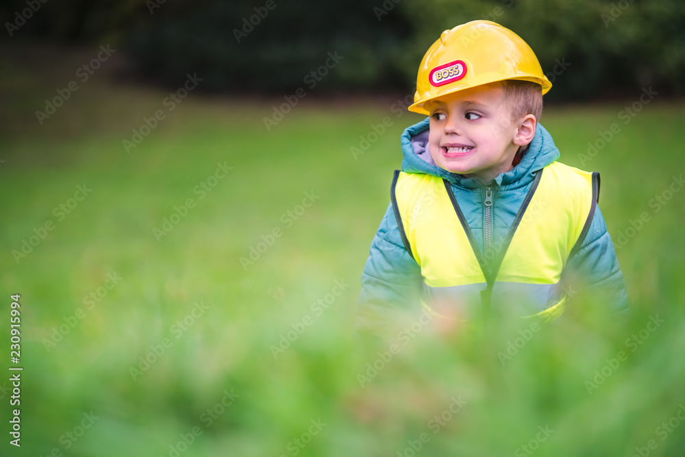 Boy pretending to be a builder foreman Boy pretending to be a builder foreman
