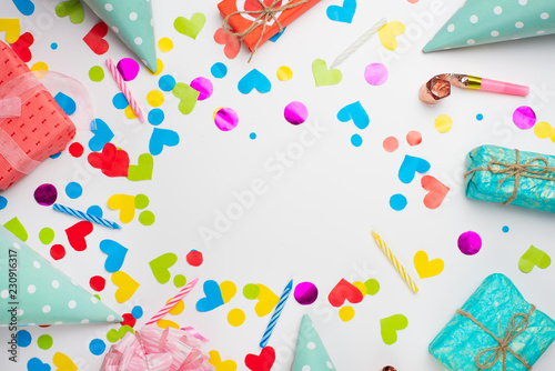 Birthday party background with party hats and streamers