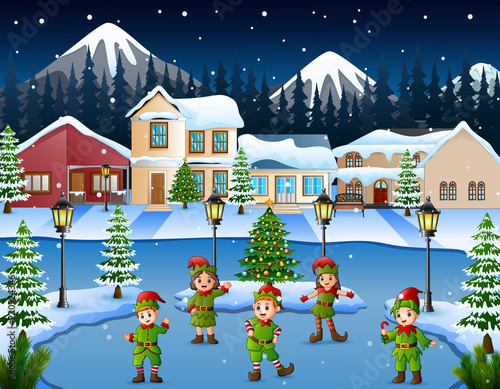 Cartoon of kid group wearing elf costume dancing in the snowy village 