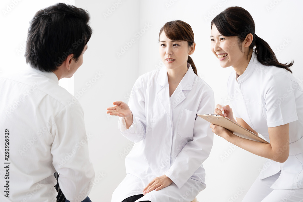 asian doctor talking to pasient in hospital asian doctor talking to pasient in hospital