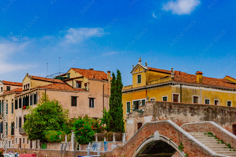 Venetian houses and bridge in Venice, Italy