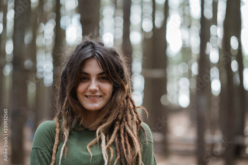 Canvas-taulu young woman hiker relaxing in the woods