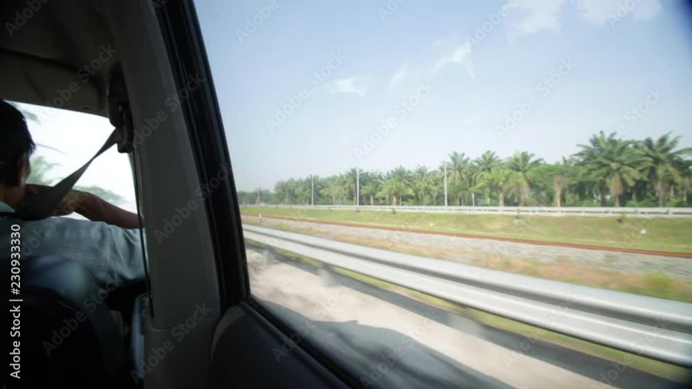 Wide angle view from passenger seat of a car in Indonesia Wide angle view from passenger seat of a car in Indonesia
