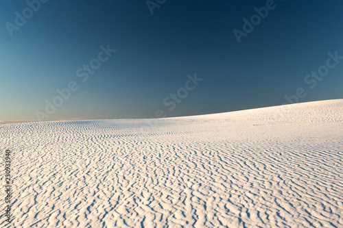 Sand dunes during the day photo