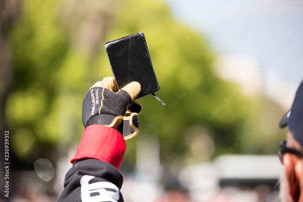 Φωτογραφία Word of God Held High