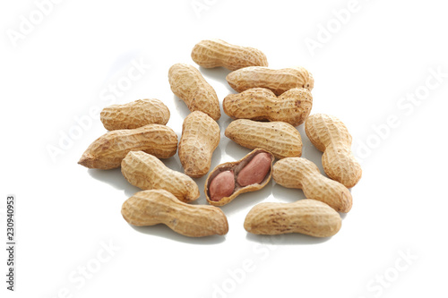 Peanuts.  unpeeled nuts isolated on white background. Peanut macro. Selective Focus
