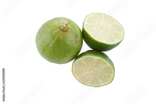 Green Lime with slice cutting isolated on white background