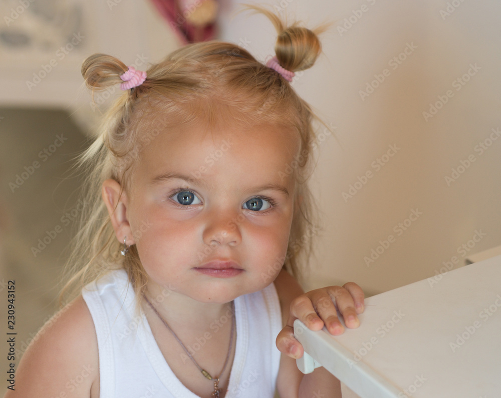 Being a real cutie. Small girl with bun ponytails. Small child wear funny  hairstyle. Adorable child with blond hair. Fancy girls hairstyle. Hair  salon for kids. Fancy stuff Stock Photo | Adobe