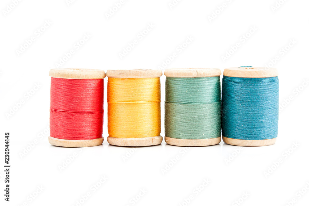 Old wooden coils of thread. Old wooden coils of thread.