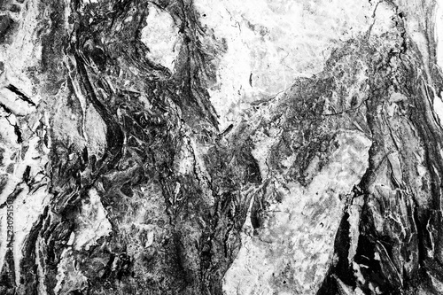 Black and white high contrast marble texture, desaturated high contrast image photo