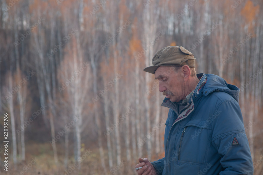 A rustic man with a mustache. Russia. Kaluga region. Village A rustic man with a mustache. Russia. Kaluga region. Village