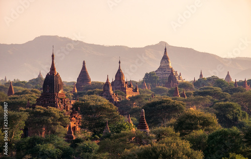 Landscape view of ancient temples at colorful golden sunset  Bagan  Myanmar