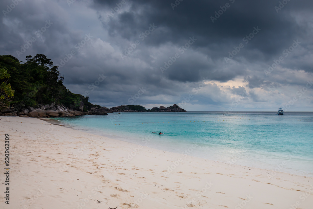 Stormy skies on a deserted tropical beach during the monsoon (Similan Islands)