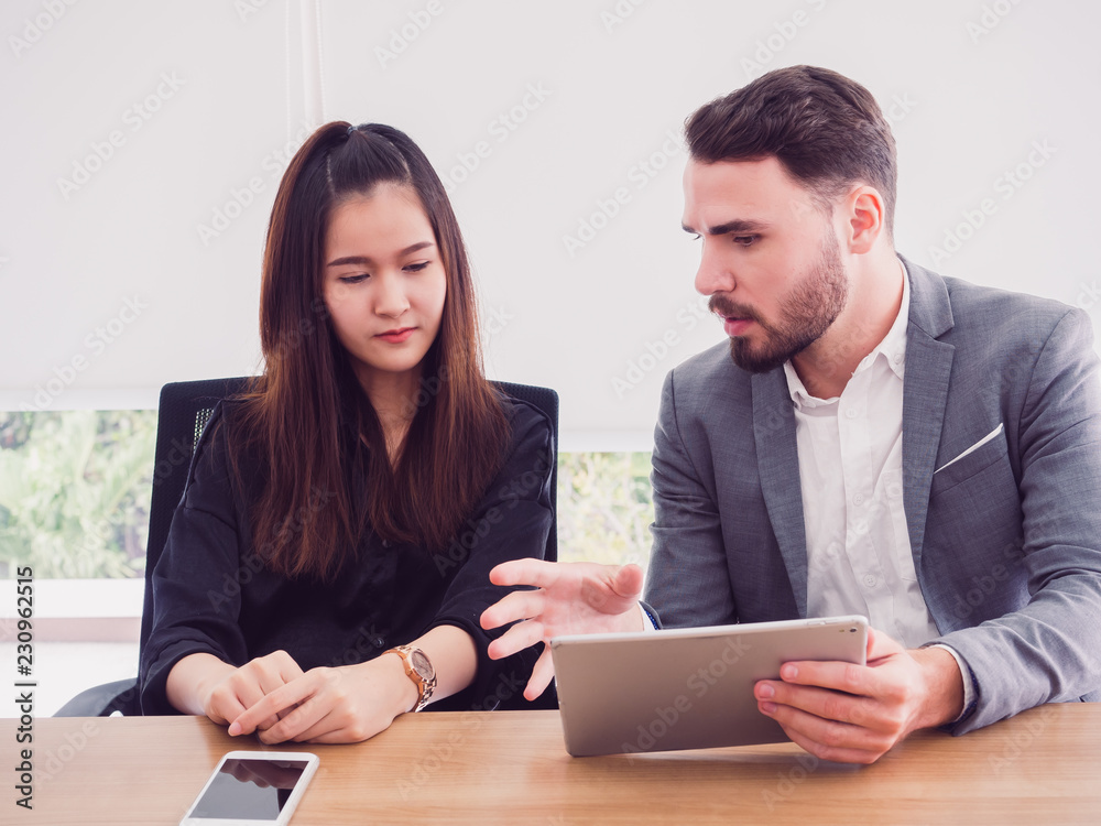 business people in meeting room,Business team explaining new business ideas business people in meeting room,Business team explaining new business ideas