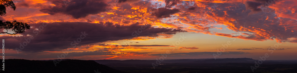 Sunset at Hunter Lookout, Watagans, Australia. Sun reflecting off beautiful cloud formation.