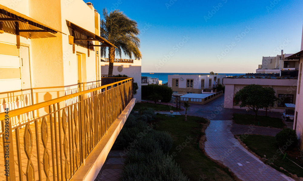 Fototapeta premium Sunset over the resort area of the Red Sea coast in Egypt. Holiday in Sharm El Sheikh