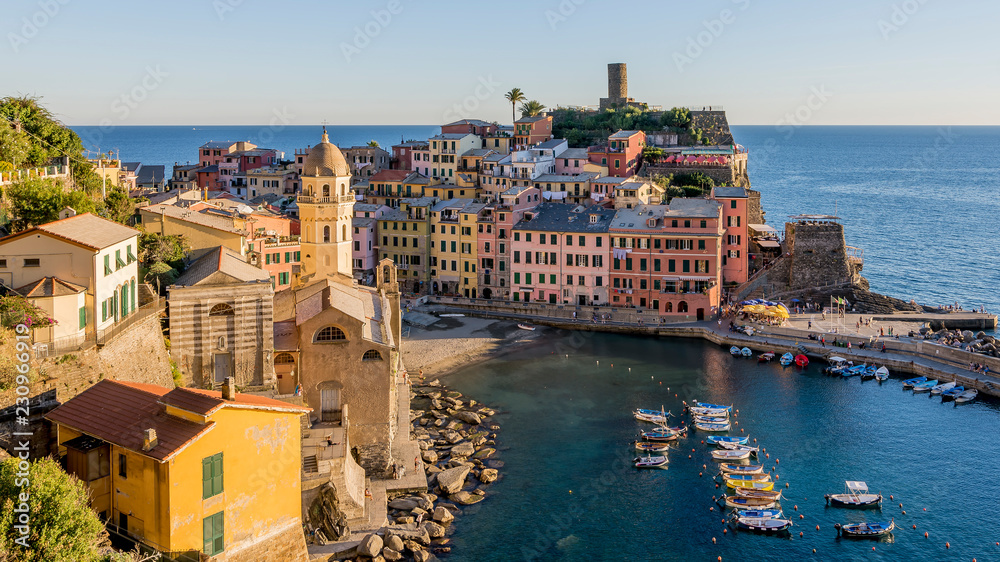 Detailed aerial view of the historic center of Vernazza illuminated by the golden light of sunset, Cinque Terre, Liguria, Italy