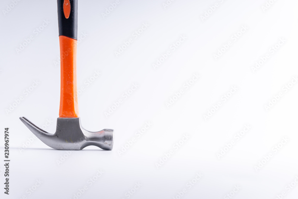 Hammer closeup on white background with selective focus and crop fragment Hammer closeup on white background with selective focus and crop fragment