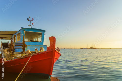 wooden fishing boat moored in port of Zante town.