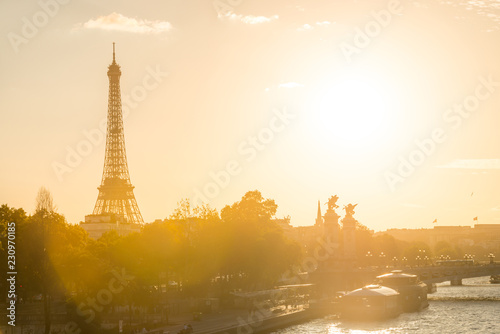 Beautiful sunset with Eiffel Tower and Seine river in Paris, France