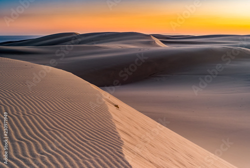 Fototapeta Naklejka Na Ścianę i Meble -  Sunset at Stockton Sand Dunes, Australia. 