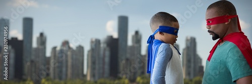 Photography Composite image of father and son pretending to be superhero